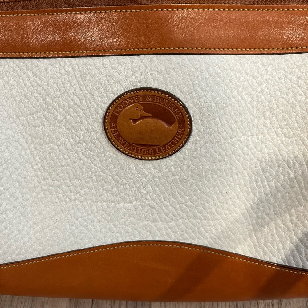 Dooney & Bourke White and Tan Messenger Bag with Leather Accents